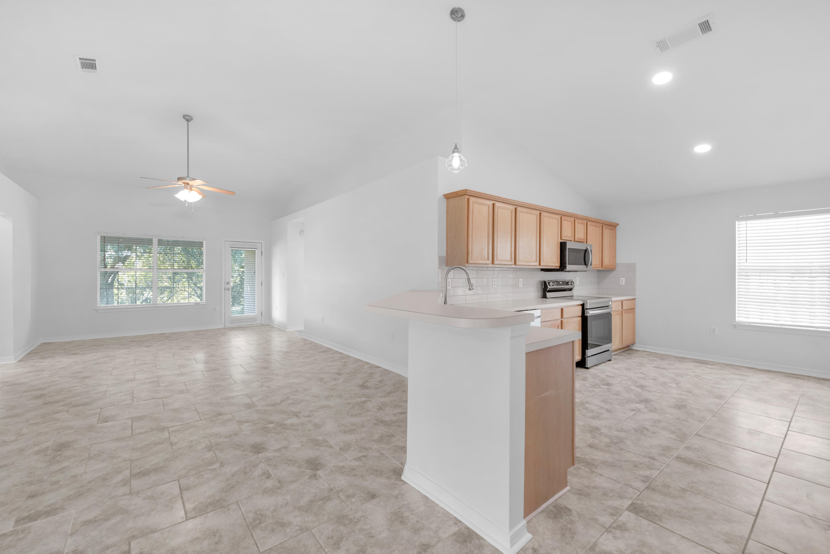161 South Harborview Road Santa Rosa Beach, FL 32459 - Photo 39 of 39 a view of a kitchen with a sink cabinets and window