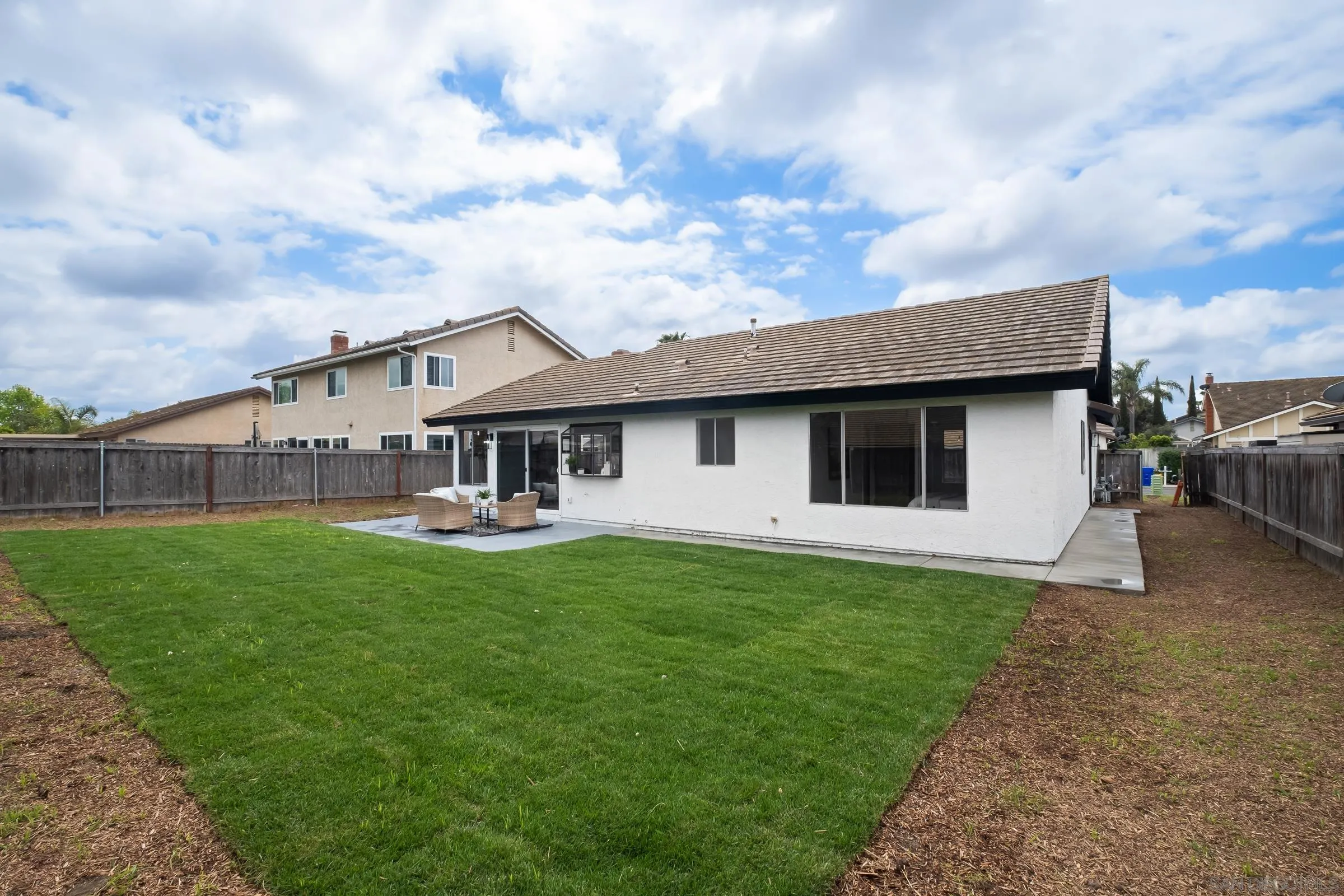 4436 Point Vicente Oceanside, CA 92058 - Photo 21 of 23 a front view of a house with garden