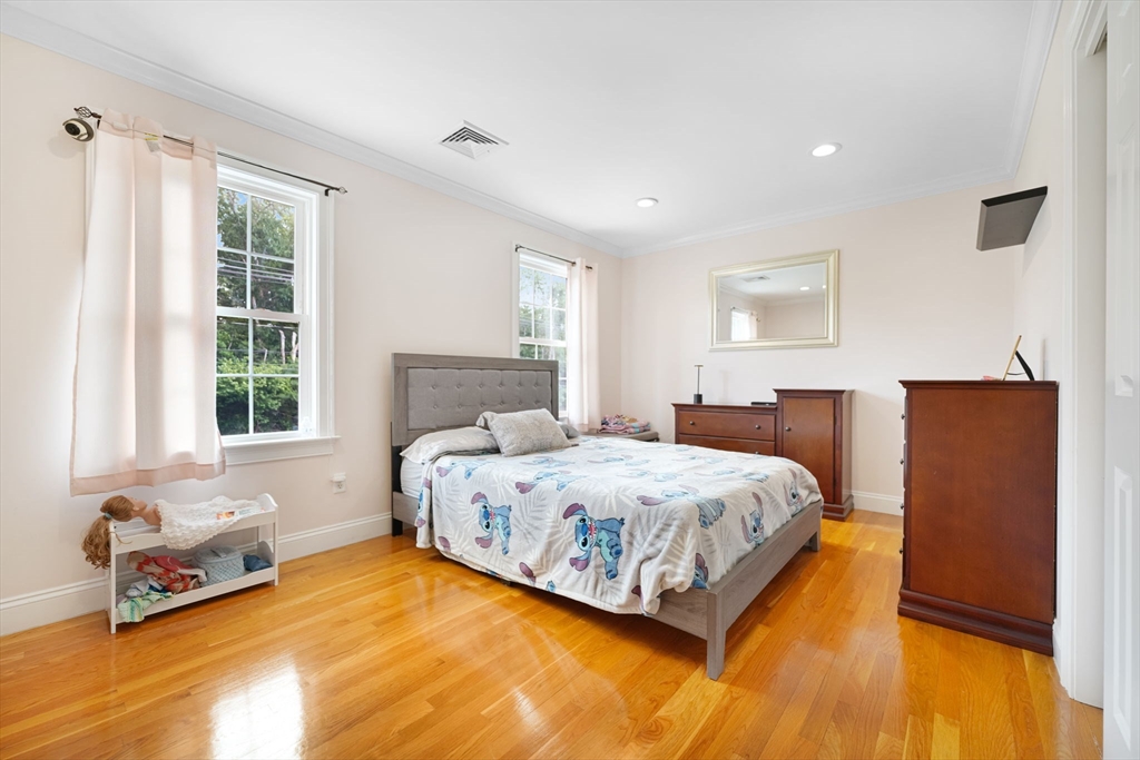 489 Main Street Acushnet, MA 02743 - Photo 20 of 37 a bedroom with a bed and window