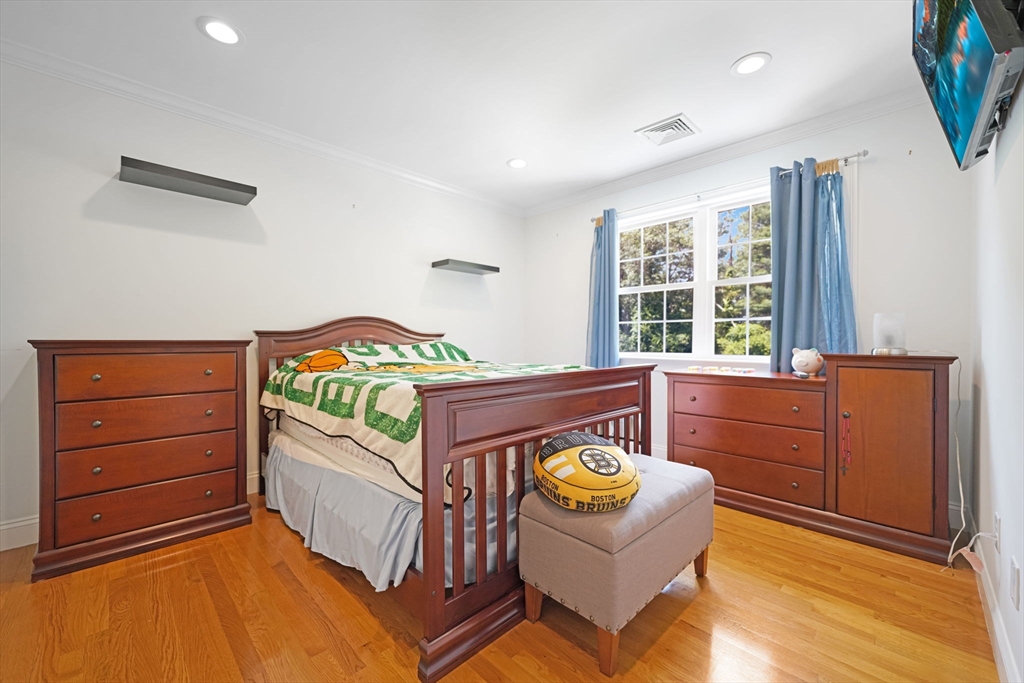 489 Main Street Acushnet, MA 02743 - Photo 22 of 37 a bedroom with a bed and a window