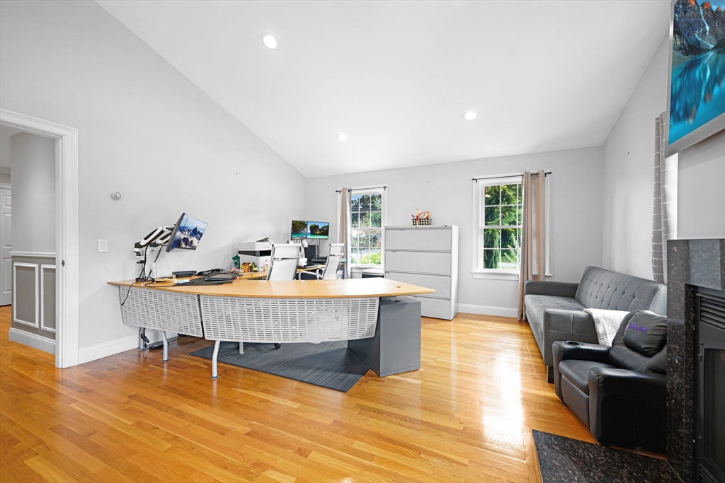 489 Main Street Acushnet, MA 02743 - Photo 24 of 37 a living room with furniture a dining table and a potted plant