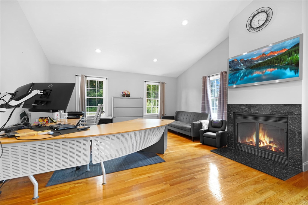489 Main Street Acushnet, MA 02743 - Photo 25 of 37 a living room with furniture and a fireplace