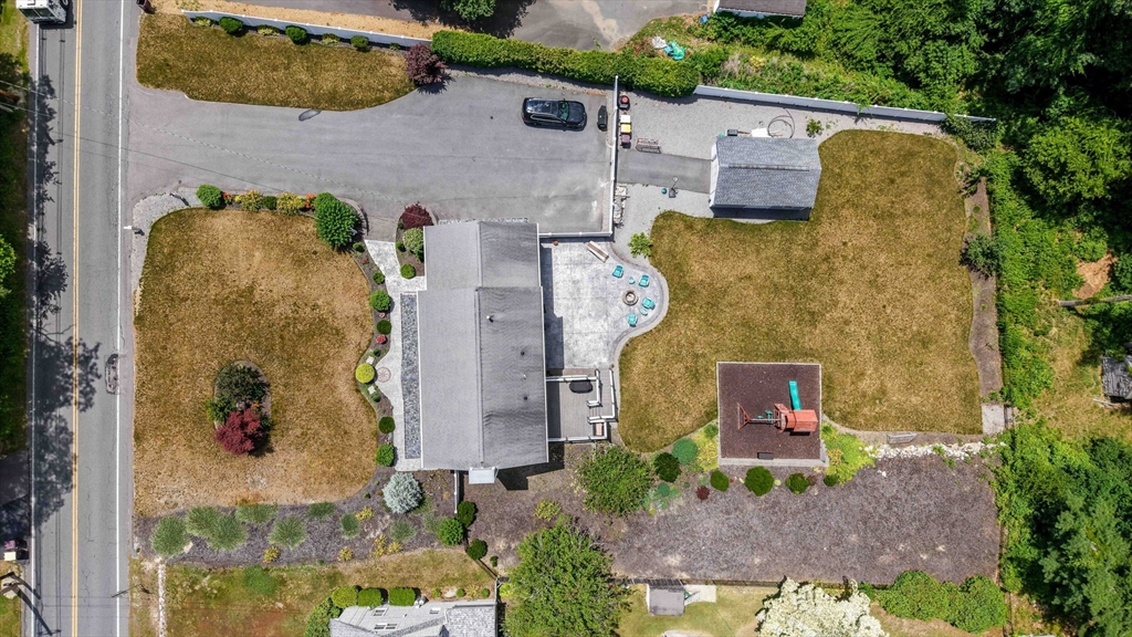 489 Main Street Acushnet, MA 02743 - Photo 33 of 37 an aerial view of a house with a swimming pool