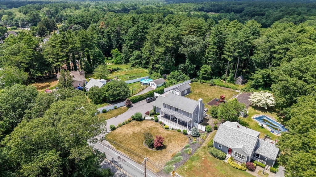 489 Main Street Acushnet, MA 02743 - Photo 4 of 37 an aerial view of a house with yard swimming pool and outdoor seating