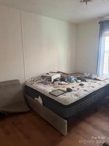 a view of a couches and table in a room