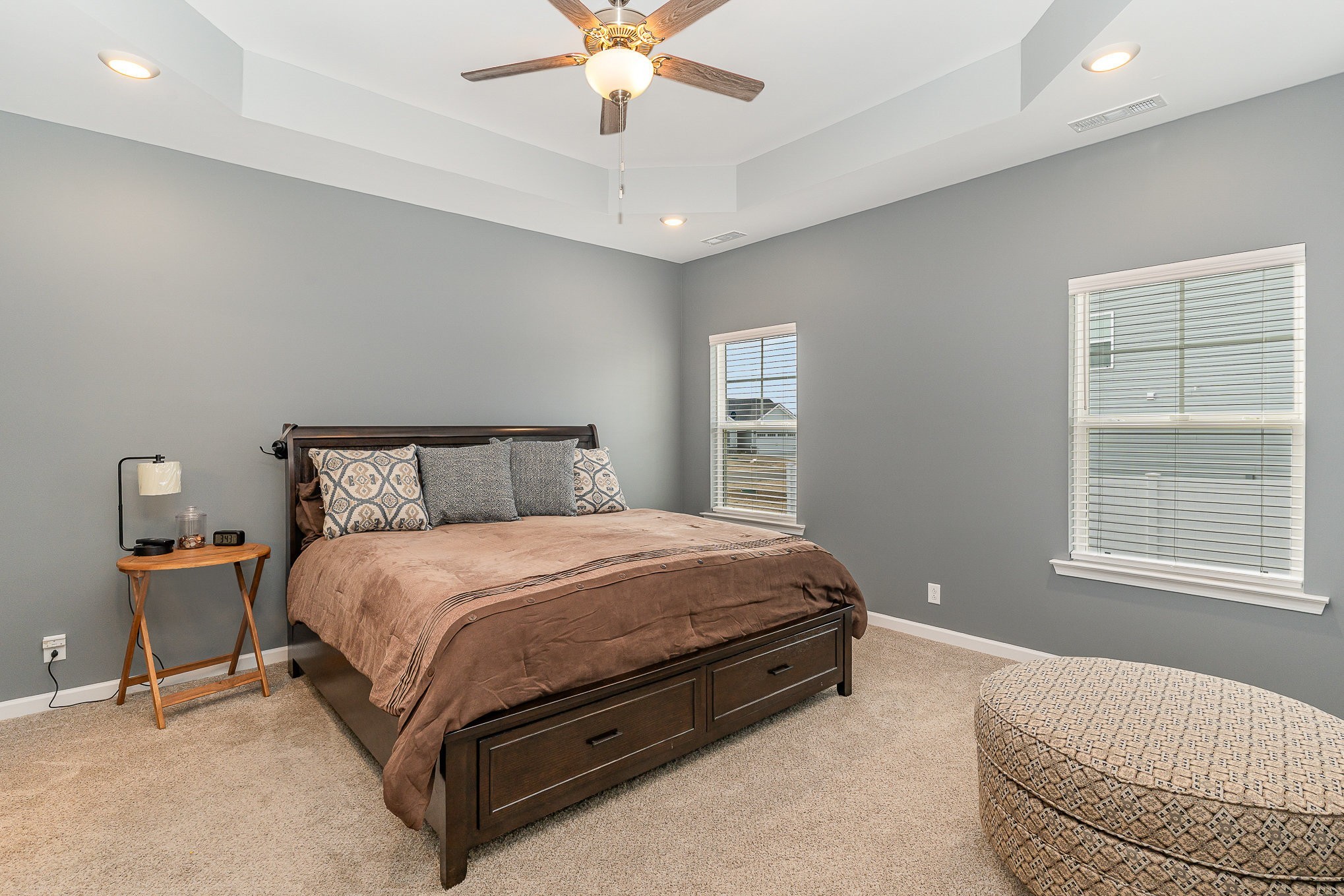 248 Ruby Cate Way Murfreesboro, TN 37128 - Photo 14 of 29 a bedroom with a bed and a chandelier