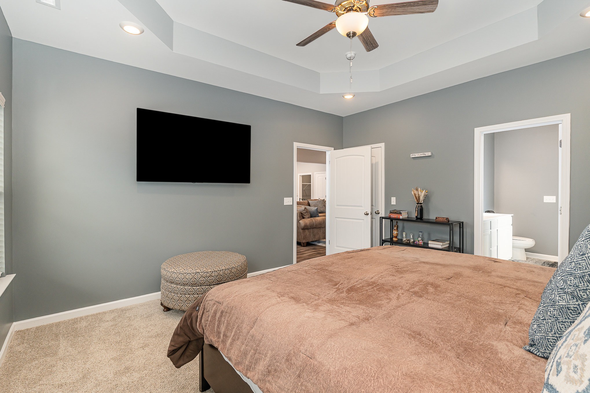 248 Ruby Cate Way Murfreesboro, TN 37128 - Photo 16 of 29 a spacious bedroom with a bed and a flat screen tv