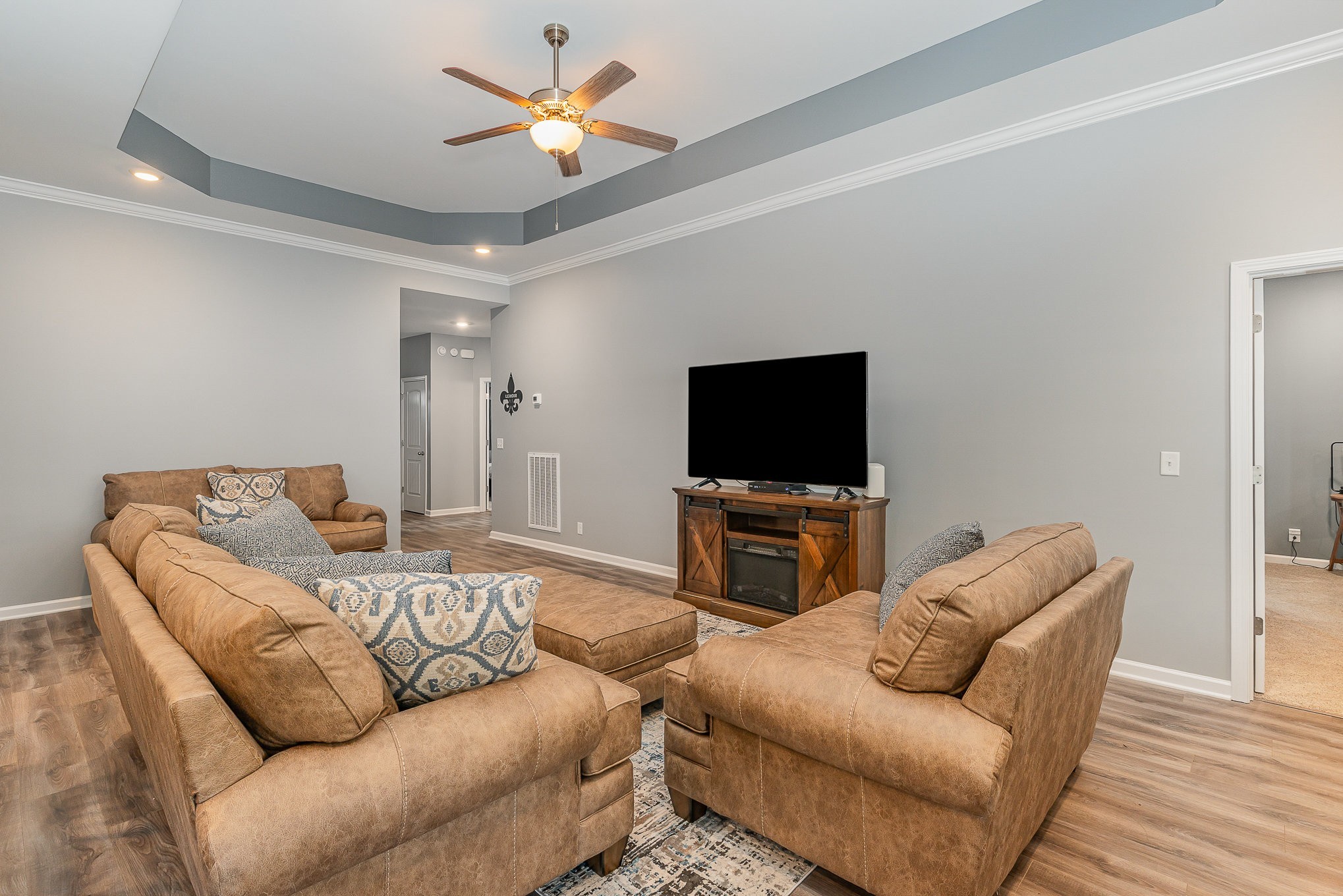 248 Ruby Cate Way Murfreesboro, TN 37128 - Photo 4 of 29 a living room with furniture and a flat screen tv