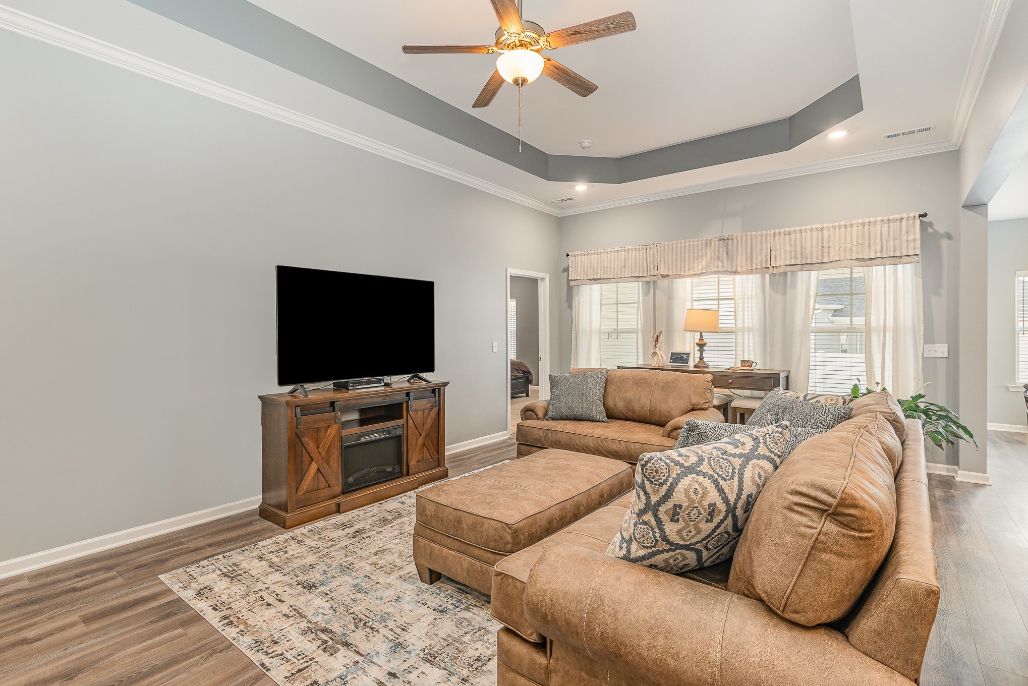 248 Ruby Cate Way Murfreesboro, TN 37128 - Photo 5 of 29 a living room with furniture and a flat screen tv
