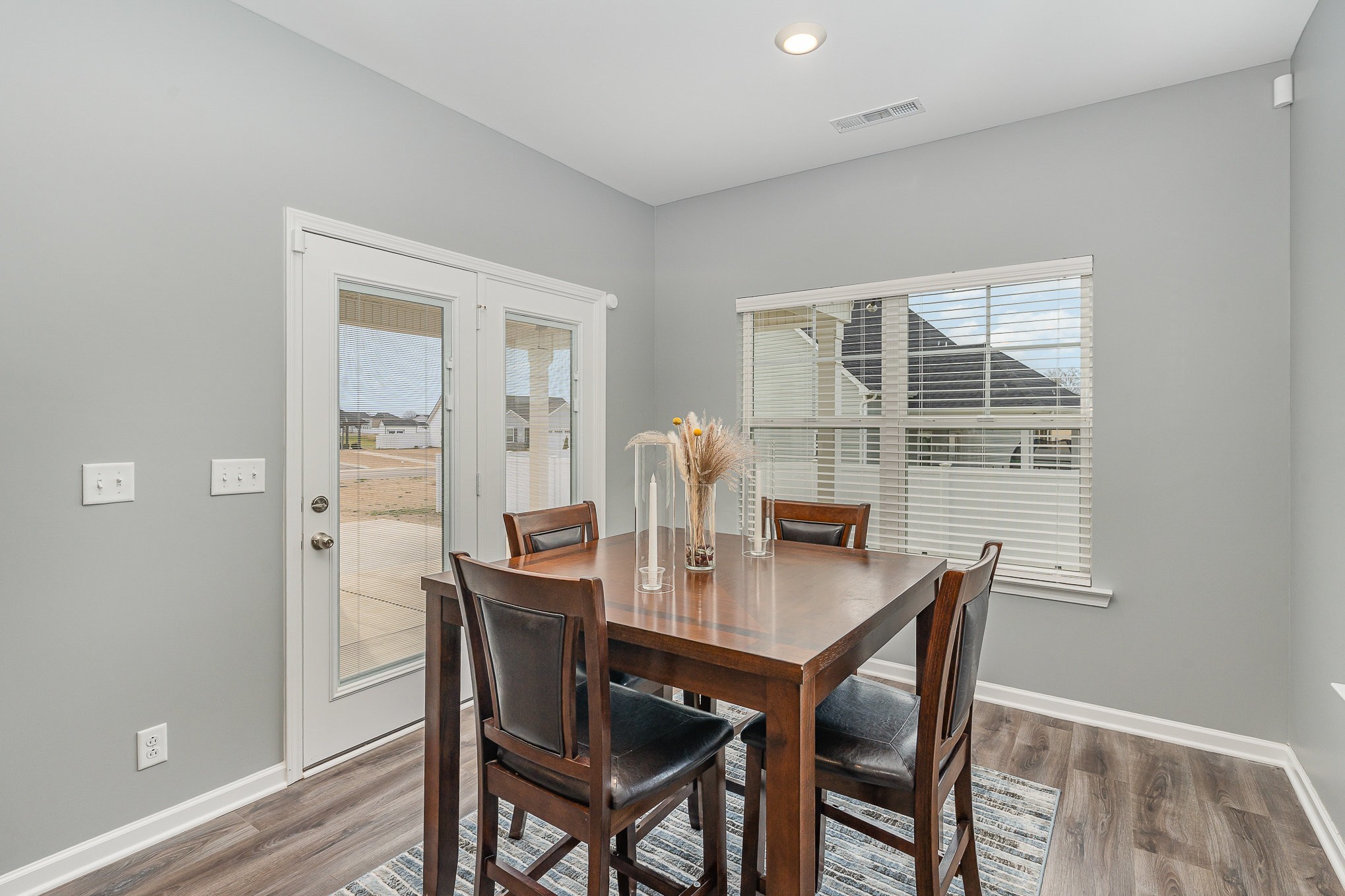 248 Ruby Cate Way Murfreesboro, TN 37128 - Photo 7 of 29 a view of a dining room with furniture window and wooden floor