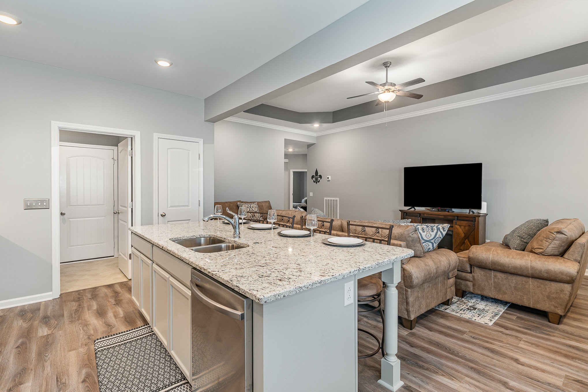 248 Ruby Cate Way Murfreesboro, TN 37128 - Photo 9 of 29 a view of living room with granite countertop furniture and a flat screen tv