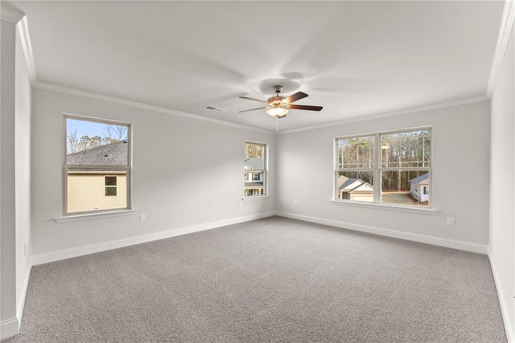 484 Magnolia Grove Place Cornelia, GA 30531 - Photo 23 of 36 a view of an empty room with a window