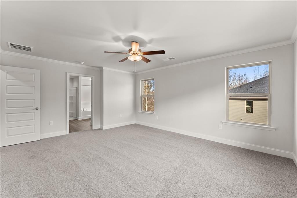 484 Magnolia Grove Place Cornelia, GA 30531 - Photo 24 of 36 a view of an empty room with a window