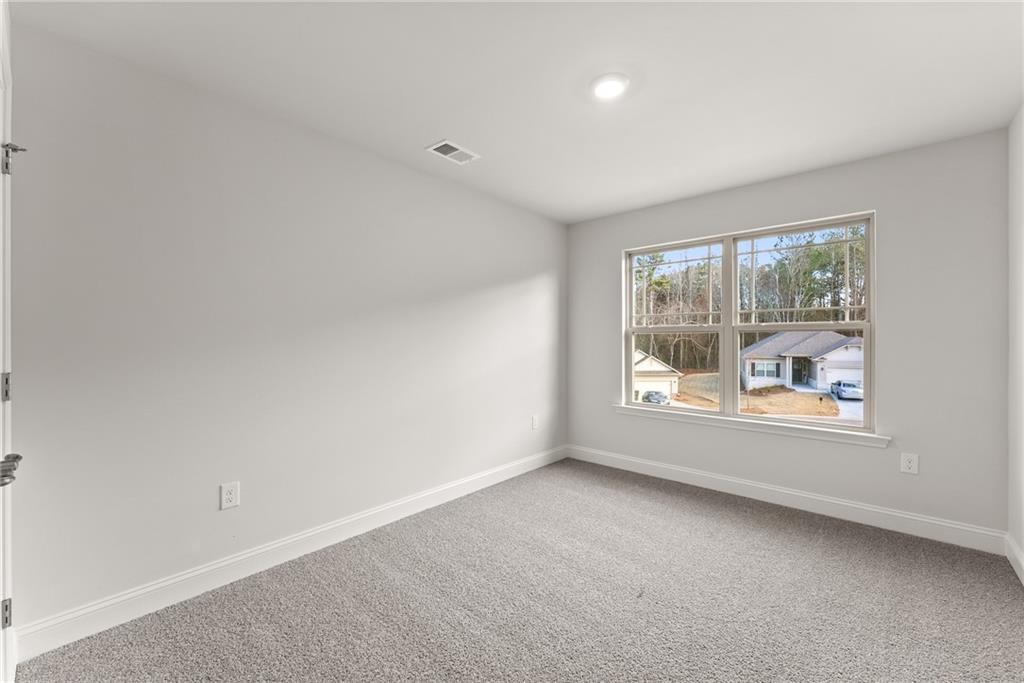 484 Magnolia Grove Place Cornelia, GA 30531 - Photo 31 of 36 an empty room with a window