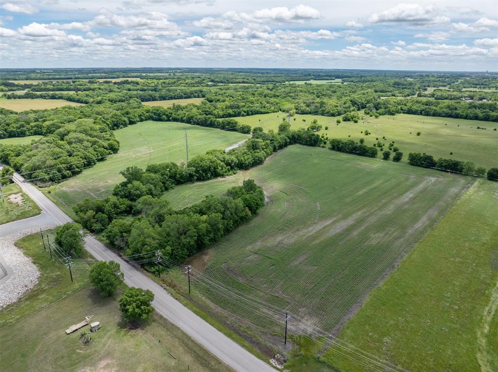 Tbd Cowan Road Celina, TX 75009 - Photo 2 of 31 a view of a lake with a houses