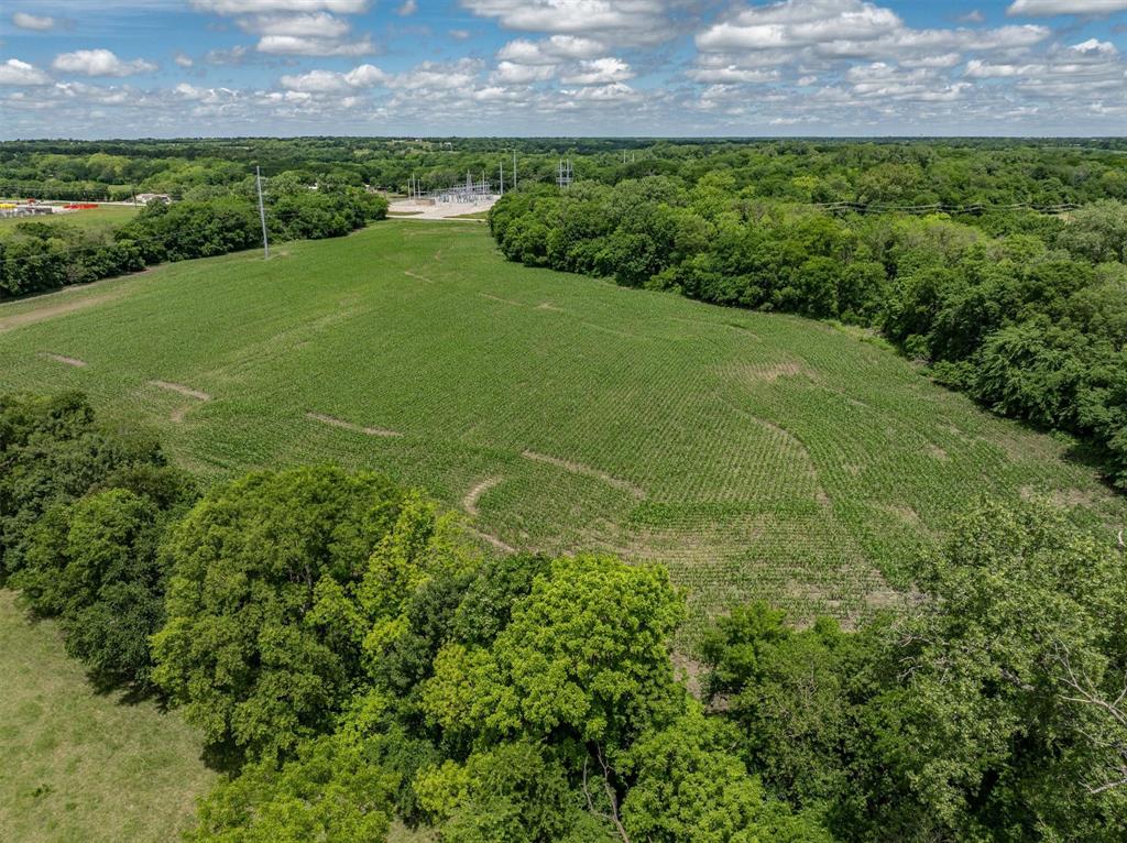 Tbd Cowan Road Celina, TX 75009 - Photo 24 of 31 a view of a garden with a building in the background