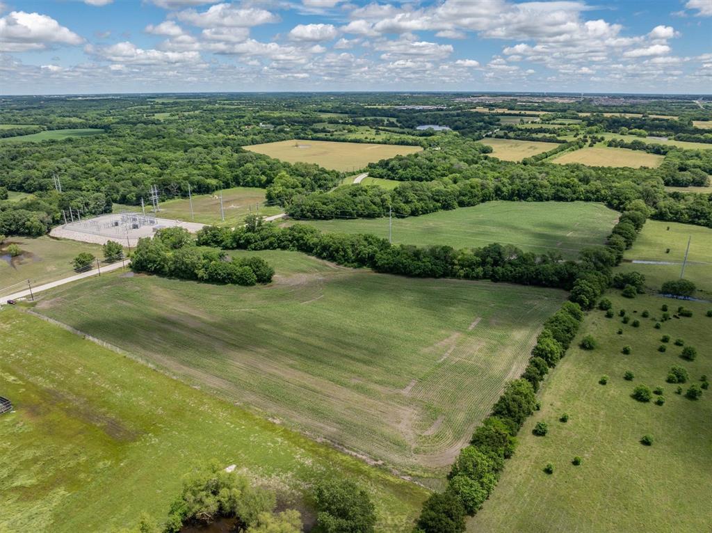 Tbd Cowan Road Celina, TX 75009 - Photo 9 of 31 a view of a lake with a houses