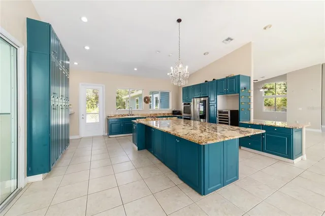 a bathroom with a double vanity sink mirror and vanity