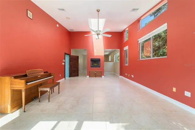 a kitchen with stainless steel appliances granite countertop a sink stove microwave and refrigerator