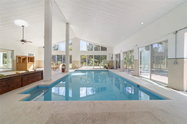 a view of a house with backyard porch and garden