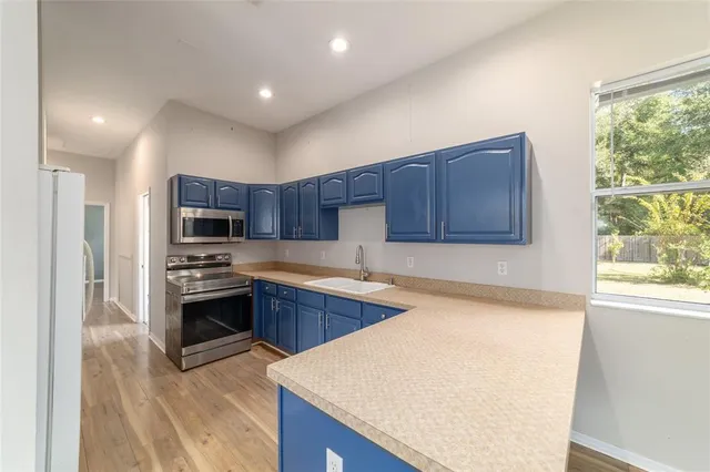 an aerial view of a house with outdoor space