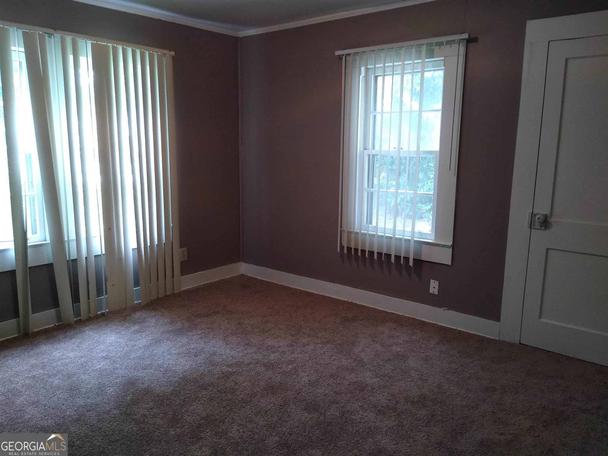 113 Maple Street Hartwell, GA 30643 - Photo 6 of 13 an empty room with windows