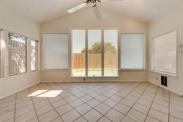 a view of an empty room and window