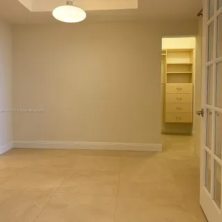 a bathroom with a sink toilet and a mirror