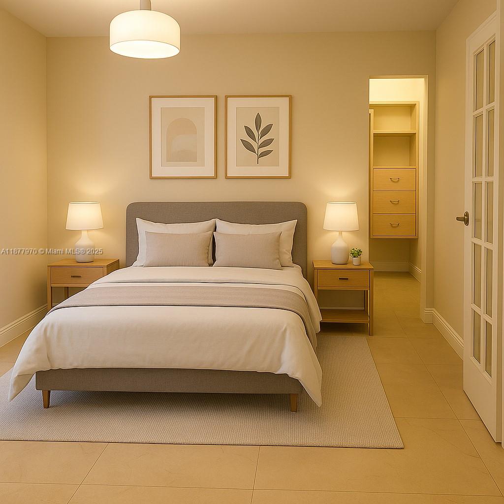 848 Brickell Key Drive, Unit 2502 Miami, FL 33131 - Photo 27 of 40 a bedroom with a bed and painting on the wall