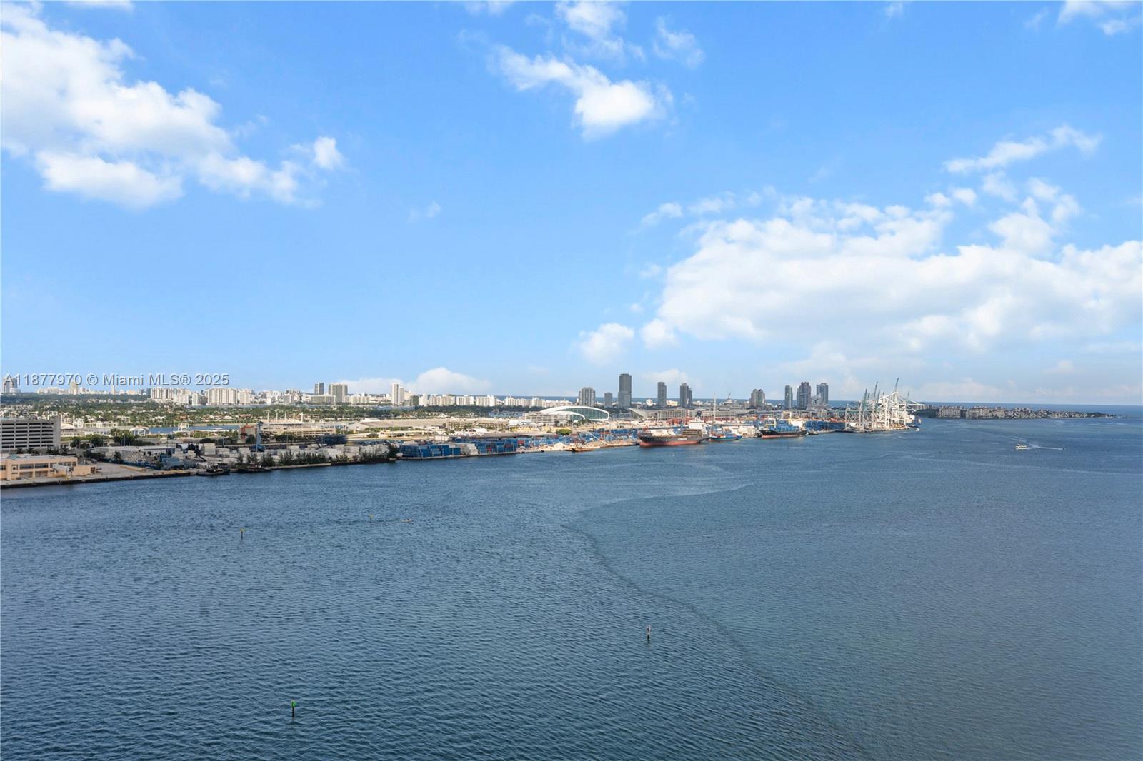 848 Brickell Key Drive, Unit 2502 Miami, FL 33131 - Photo 7 of 40 a view of an ocean and beach