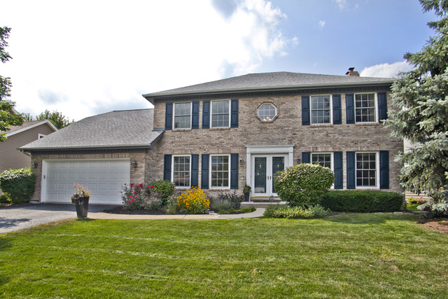 1936 Slippery Rock Road Naperville, IL 60565 - Photo 1 of 25 a front view of a house with a yard