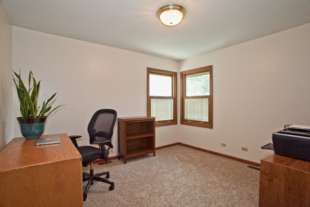 1936 Slippery Rock Road Naperville, IL 60565 - Photo 11 of 25 a view of a workspace with furniture and a window