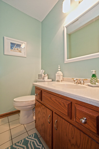 1936 Slippery Rock Road Naperville, IL 60565 - Photo 5 of 25 a bathroom with a granite countertop toilet sink and mirror