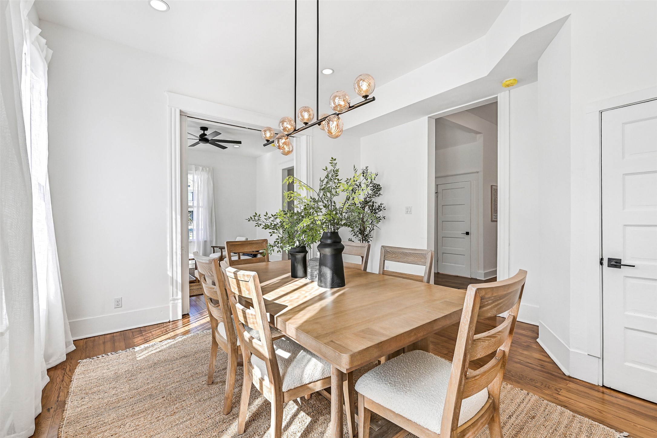 2010 Rosenberg Street Galveston, TX 77550 - Photo 2 of 50 A closer perspective shows its ideal location — near the kitchen with soft-close cabinets for effortless hosting, yet private enough for a candlelit dinner. Whether casual or formal, this space adapts with style and ease, making every meal a memorable occasion.