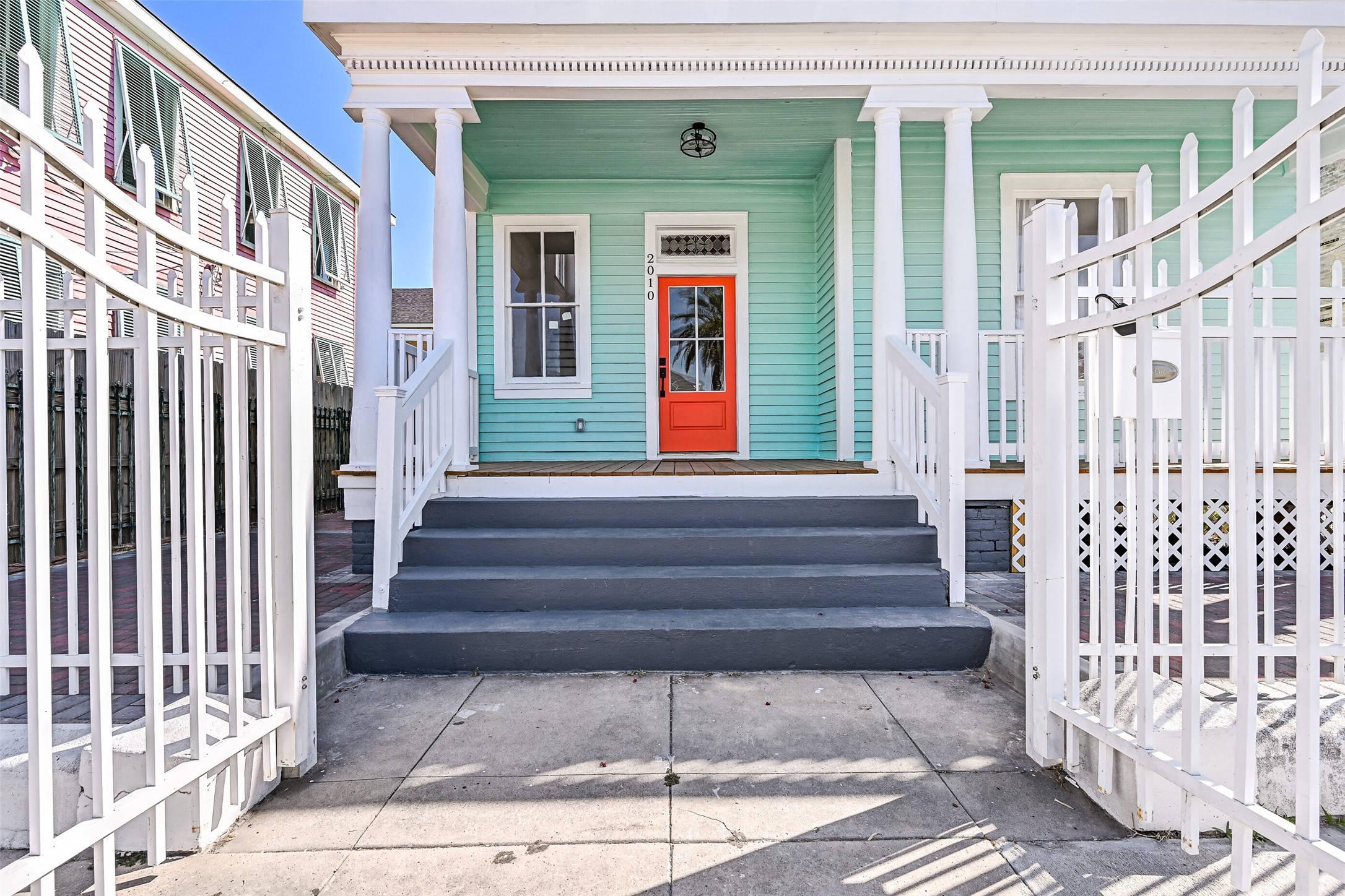 2010 Rosenberg Street Galveston, TX 77550 - Photo 5 of 50 Welcome to your private fenced retreat on 25th Street! The front porch invites you to pause, feel the coastal breeze, and watch Mardi Gras or Lone Star Rally parades from your own decks. Every detail of this remodeled home exudes charm and effortless island style, making your arrival feel like a celebration.