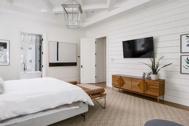 a kitchen with stainless steel appliances granite countertop a sink and a refrigerator