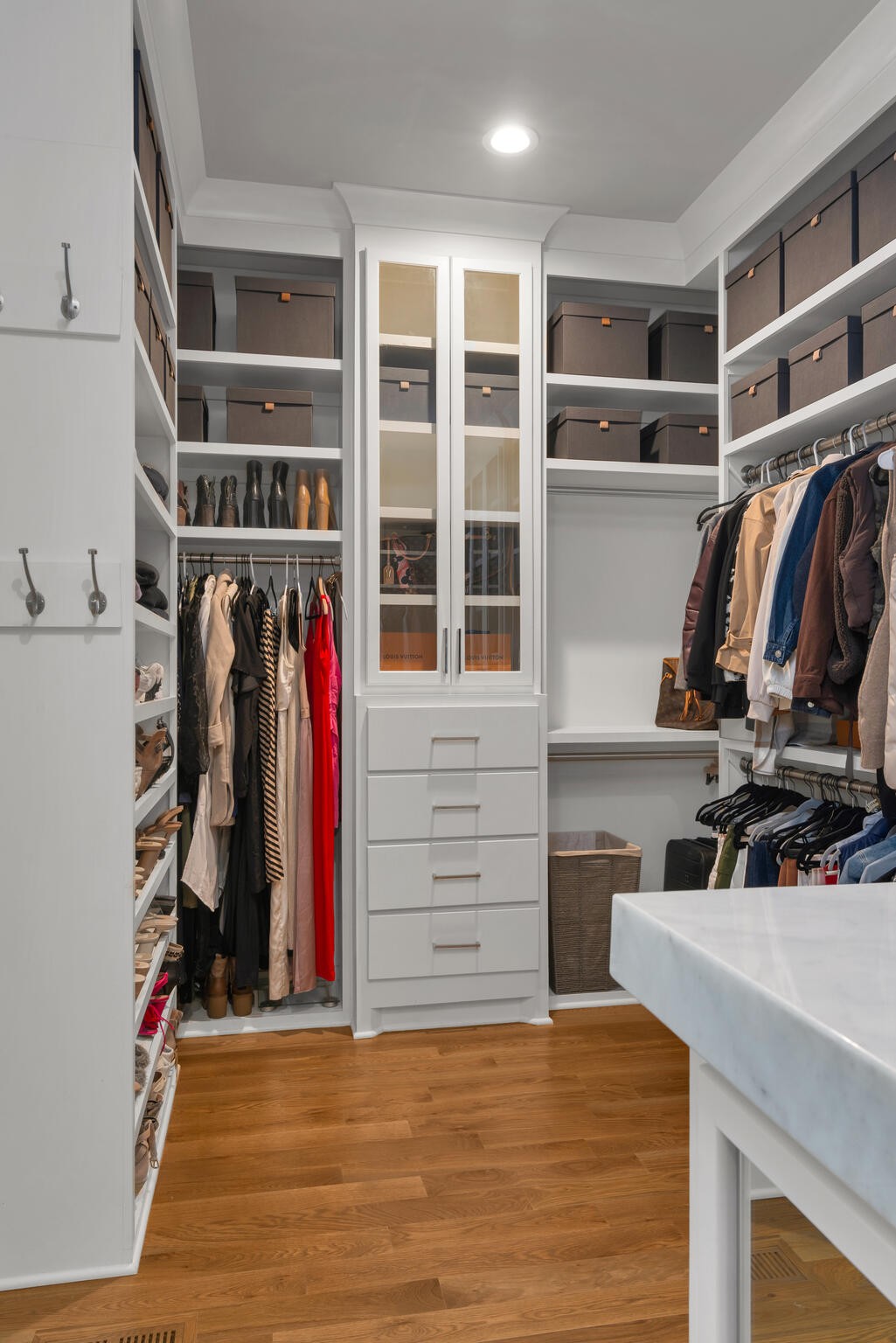 310 Lionheart Court Franklin, TN 37067 - Photo 22 of 67 a view of walk in closet with clothes and shoes