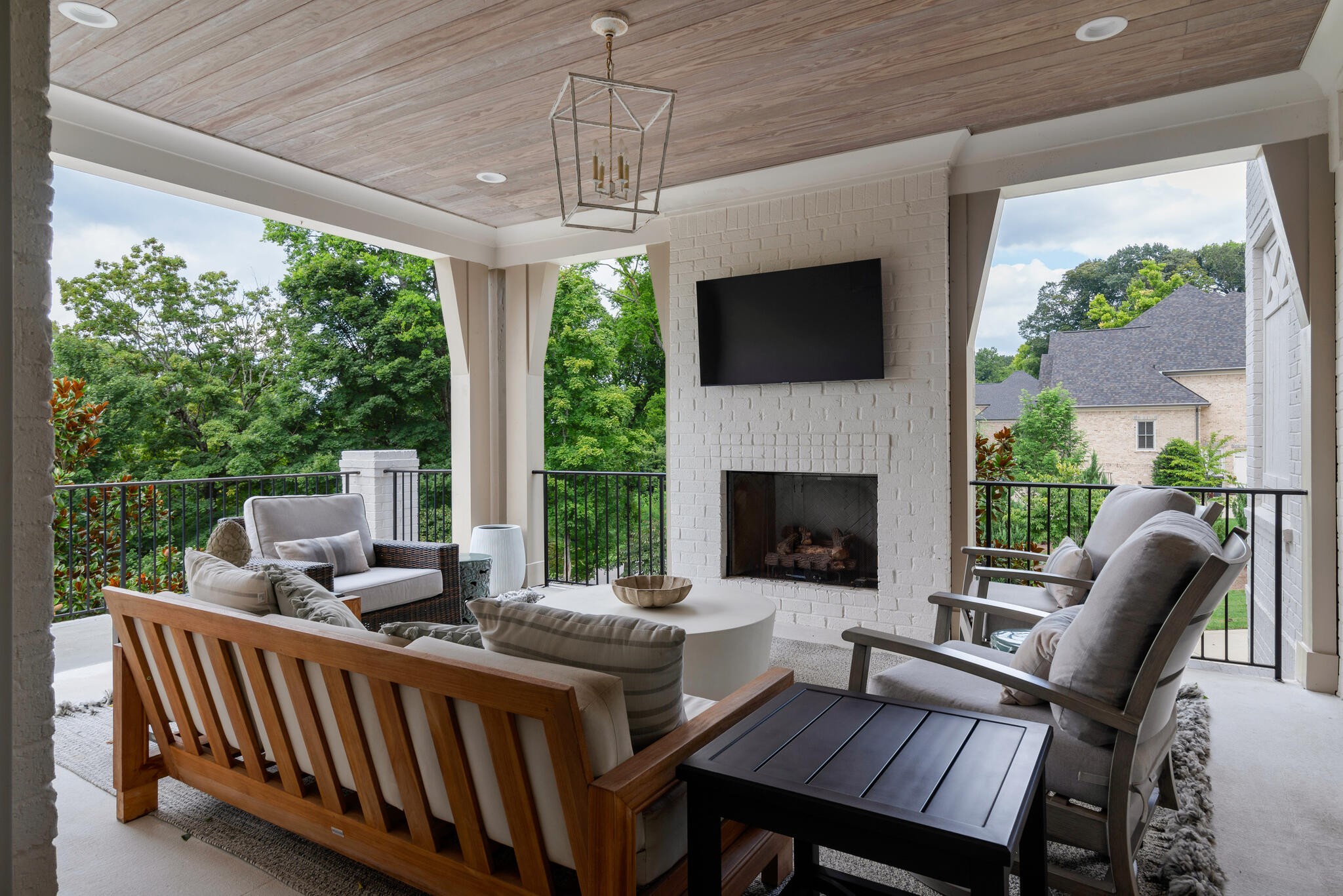 310 Lionheart Court Franklin, TN 37067 - Photo 25 of 67 a outdoor space with patio the couches and a fireplace