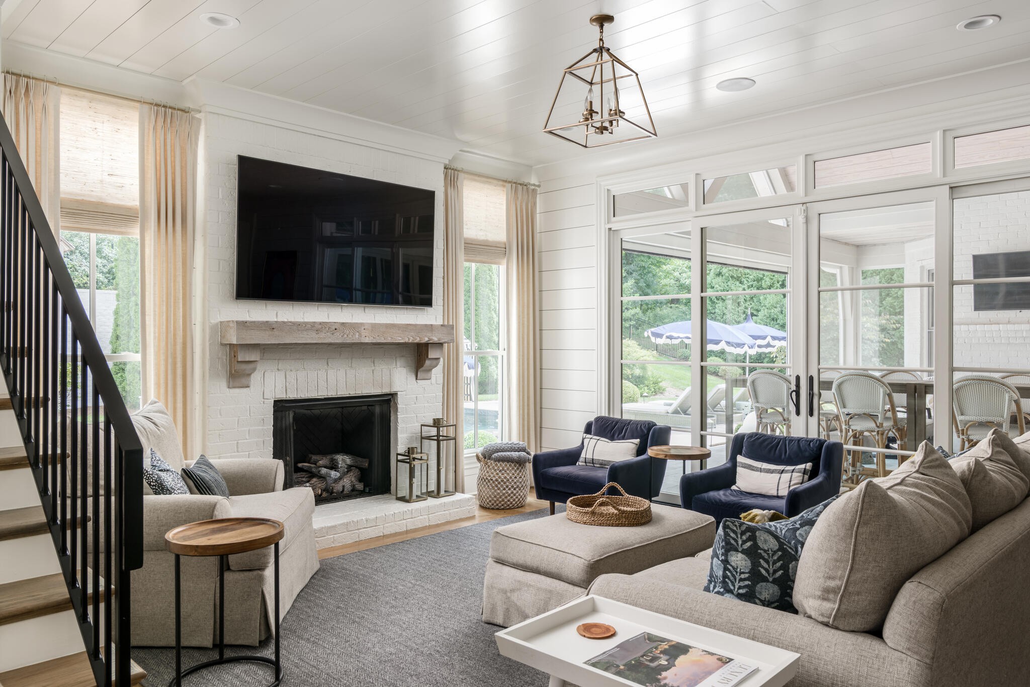 310 Lionheart Court Franklin, TN 37067 - Photo 30 of 67 a living room with furniture chandelier and a fireplace
