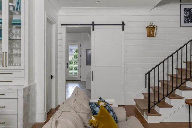 a bedroom with a bed and flat screen tv