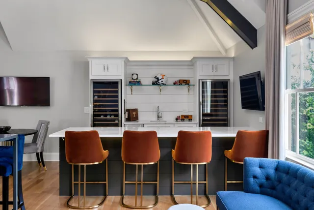 a kitchen with a sink cabinets and window