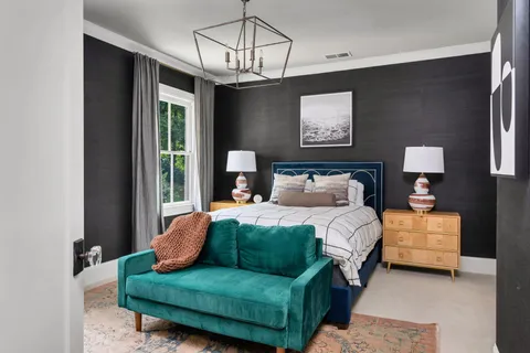 a view of a backyard with sitting area