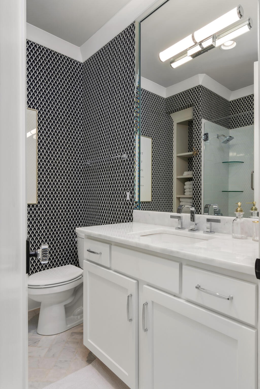 310 Lionheart Court Franklin, TN 37067 - Photo 38 of 67 a bathroom with a toilet a sink and mirror