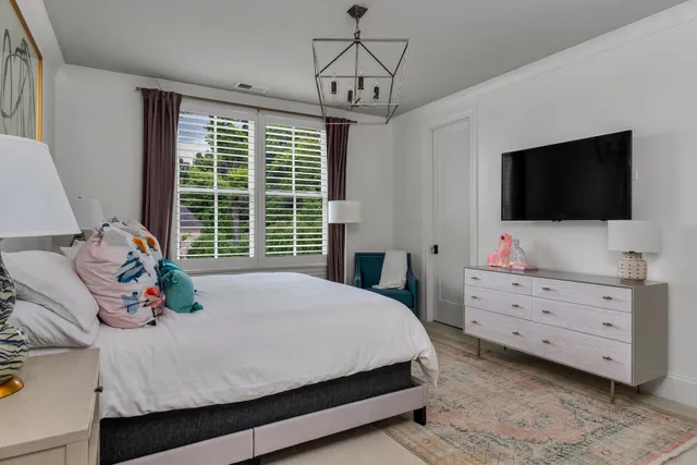 a front view of house with yard and outdoor seating