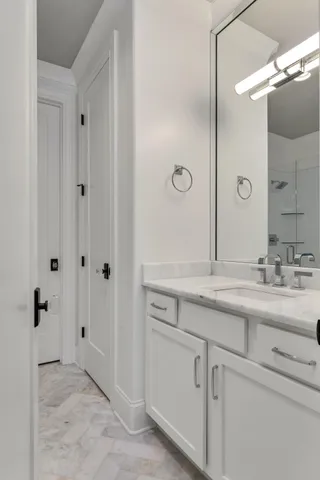 an aerial view of residential house with outdoor space and trees