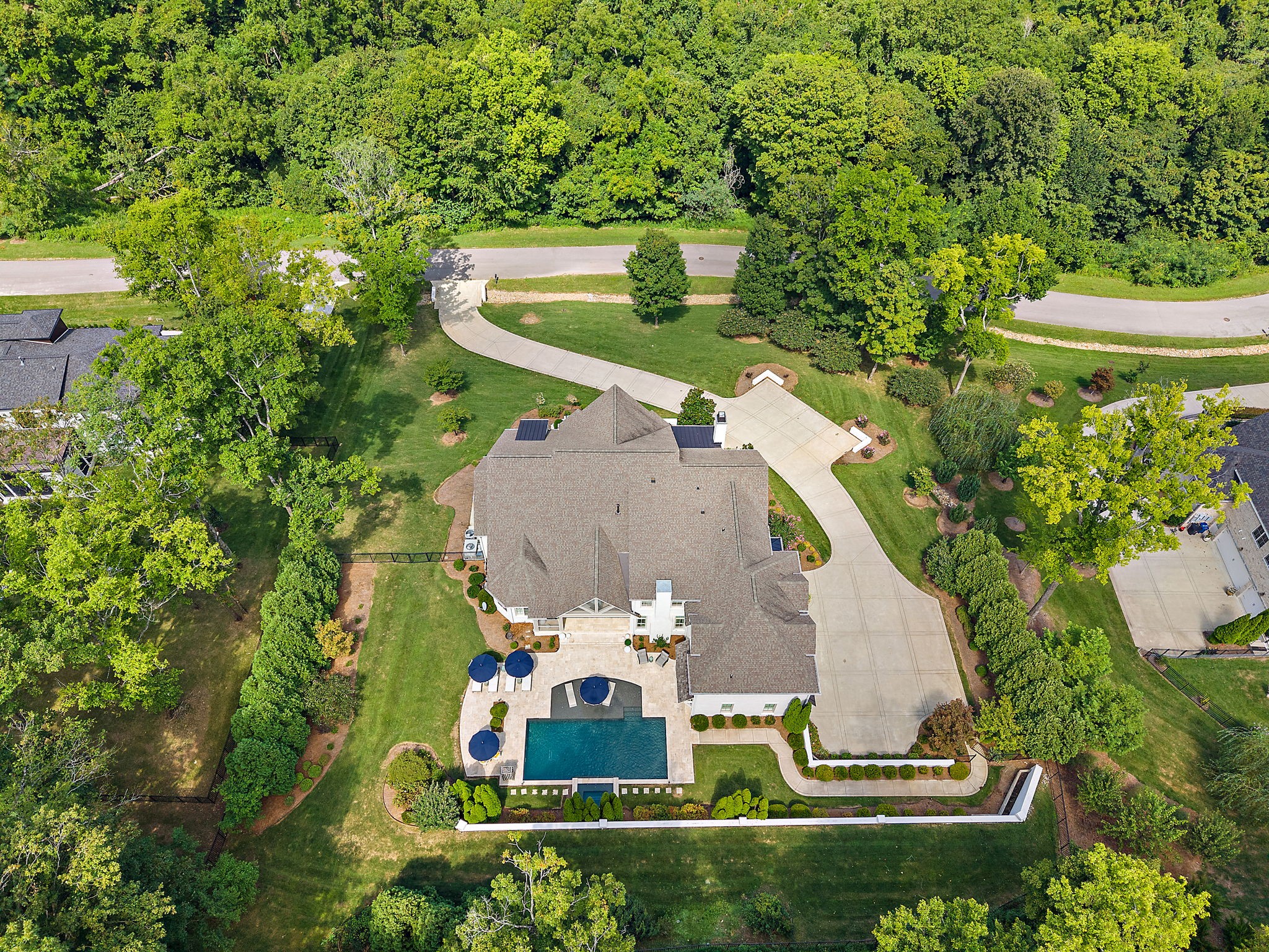 310 Lionheart Court Franklin, TN 37067 - Photo 63 of 67 an aerial view of a house with outdoor space and trees all around