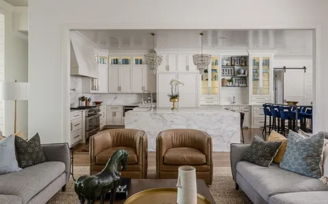 a view of cabinets and shelf with cabinets