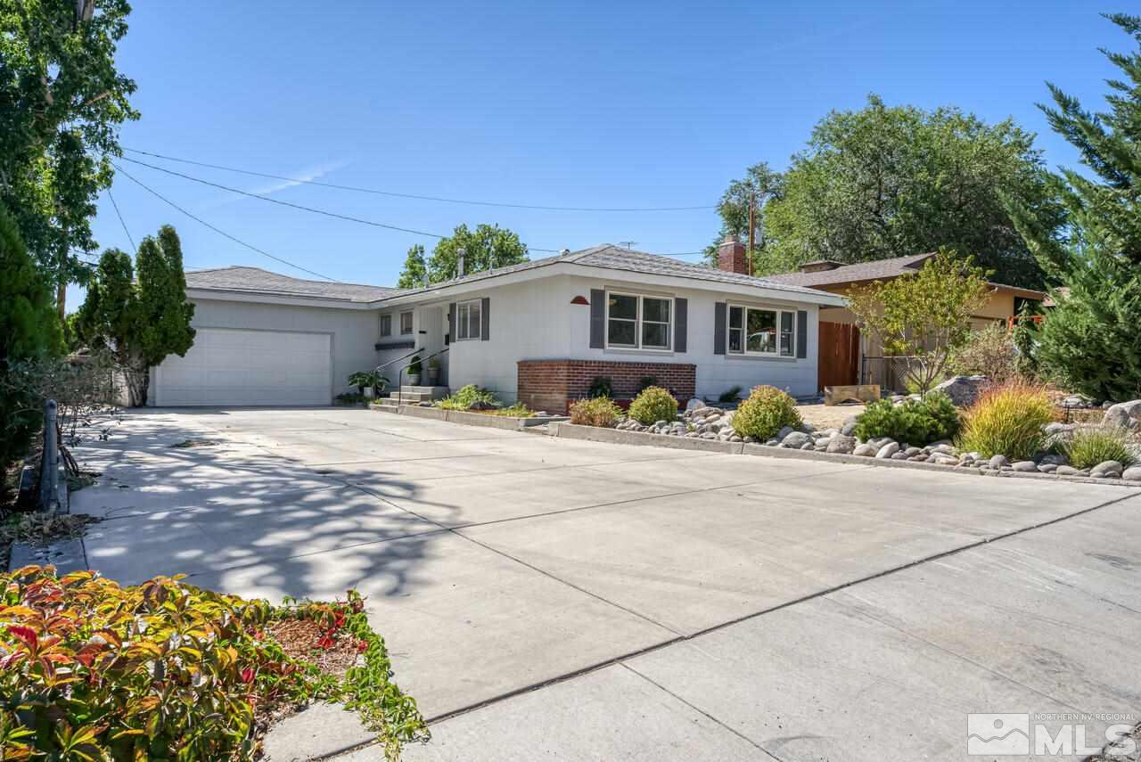1850 Marlette Avenue Reno, NV 89503 - Photo 1 of 25 a front view of a house with garden