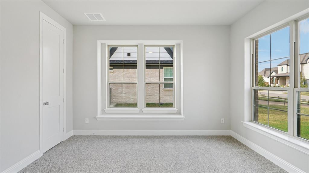 2805 Augustus Way Mansfield, TX 76063 - Photo 18 of 40 an empty room with windows