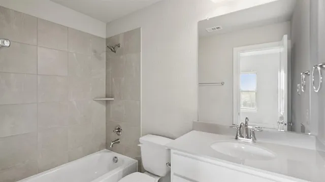 a view of a room with large windows